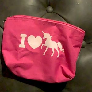 Pink I love unicorns small toy bag.